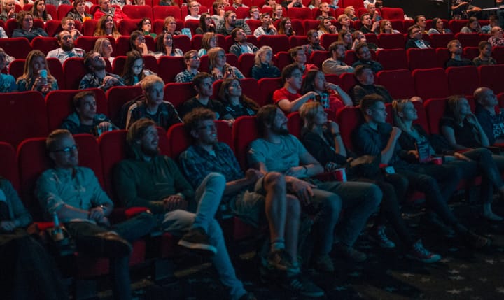 People transfixed in cinema halls